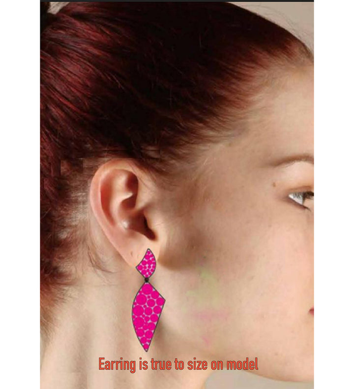 Model wearing pink dangle earring 